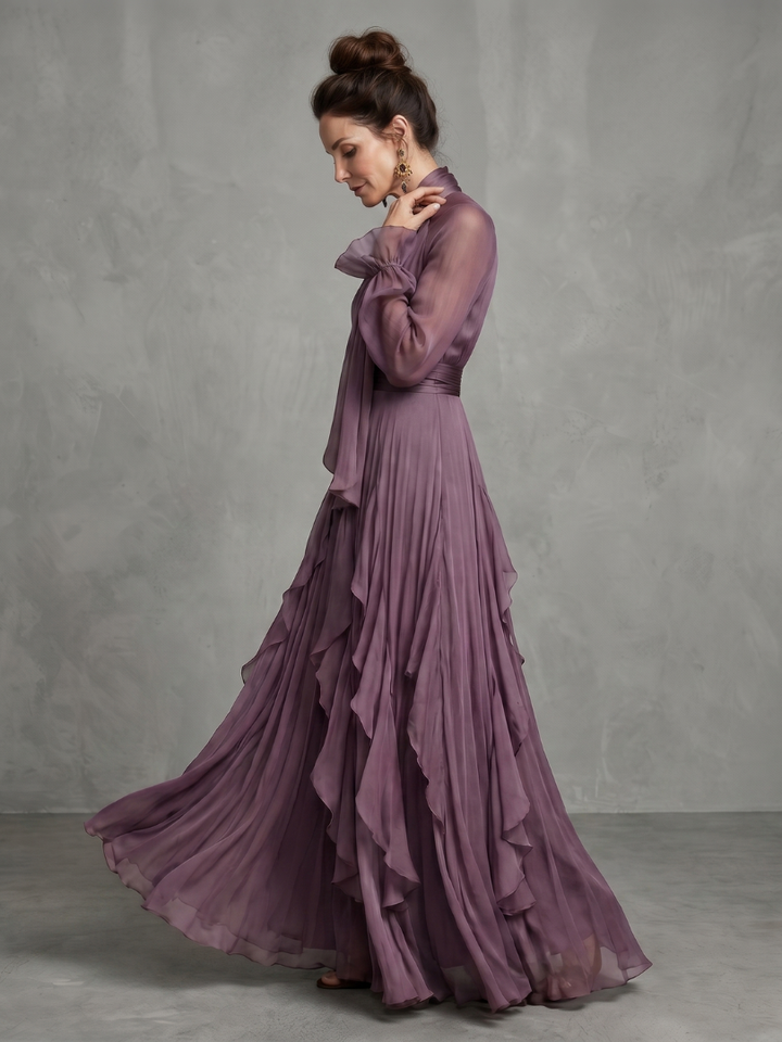 Demetria | Abito Maxi con Fiocco al Collo e Balze Stratificate